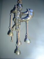 A tintinnabulum from Herculaneum (Italy), with the phallus as a beast which the human male engages in combat.