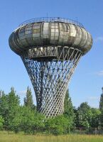 Hyperboloid water tower with toroidal tank, Ciechanów, Poland , 1972.
