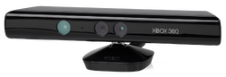 A long, black plastic tube with a stand on its bottom and sensors arrayed along its front. The Xbox 360 brand is displayed next to the sensors.