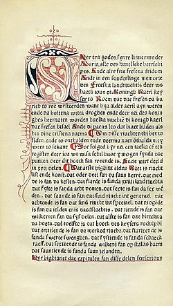 A manuscript written in very thin blackletter font with red ornamentation throughout; the incipit begins with an extremely ornate letter which is colored in both red and black