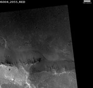 Kipini Crater south rim, as seen by HiRISE. Scale bar is 500 meters long.