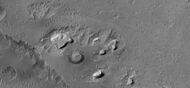 Layered mesas, as seen by HiRISE under HiWish program. Location in Terra Meridiani.