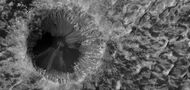 Close view of crater on floor of Danielson Crater, as seen by HiRISE under HiWish program