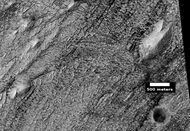 Layers, crater, and mounds on floor of Danielson Crater, as seen by HiRISE under HiWish program