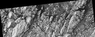 Layers and dark dust in Danielson Crater, as seen by HiRISE under HiWish program