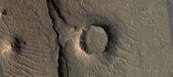 Eroded craters, as seen by HiRISE. One crater is half eroded away. Another crater has eroded to form a tall, thin rim. And, its ejecta has been eroded away. This image is part of an image that was named HiRISE picture of the day.