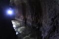 Flashlight (torch) lighten the way through Hezekiah's Tunnel