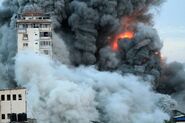 Highrise residential building "Palestine Tower"[30] in Gaza following an Israeli strike during the Gaza war.