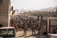 US Marines with SP-MAGTF-CR-CC at an evacuation checkpoint at Kabul Airport on 21 August during the 2021 Fall of Kabul, at the end of the War in Afghanistan.