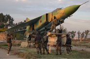 Syrian rebels at Hama Air Base during the Syrian civil war.