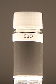 Copper(II) oxide in a vial