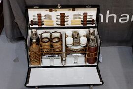 Carefully packed tableware in a picnic set for four persons (1909)