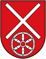 Gules a fillet saltire couped argent above a wheel of the same (Klein-Winternheim)