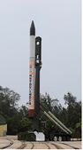 HSTDV cruise vehicle mounted atop a solid booster stage before launch.