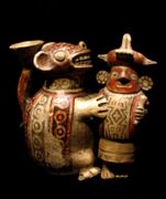 Recuay effigy of a feline attacking a warrior, Musée du Quai Branly, Paris
