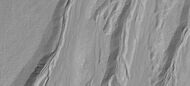 Close-up of gullies showing streamlined forms in channels, as seen by HiRISE under HiWish program Note: this is an enlargement of a previous image.