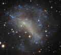 IC 4710 lies roughly 25 million light-years away in the southern constellation of Pavo.[20]
