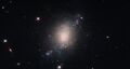 ESO 486-21 is a spiral galaxy with a somewhat irregular and ill-defined structure.[21]