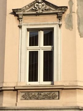 Detail of cartouche (design) and pediment