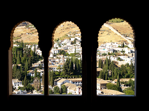 Granada through windows of the Alhambra Palace.jpg