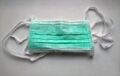 A surgical face mask, meant for single use.[67] It is a type of the face masks often used to prevent the spread of Coronavirus. They are used in countries with coronavirus disease (COVID-19) outbreaks and are worn in hospitals as well as in public. They are not designed to protect the wearer from inhaling airborne bacteria or virus particles and are less effective than respirators, such as N95 or FFP masks.[70]