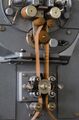 A synchronous-motor moves the paper strips across the reader.