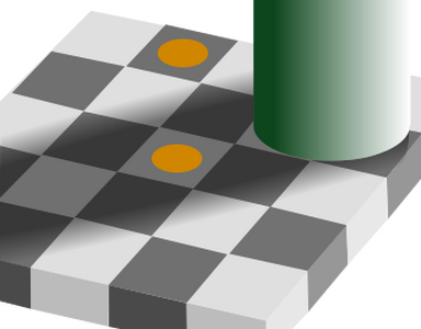 The colored disks appear to be brown and orange, but are actually an identical shade; their perceived color depends on the shade of grey they are surrounded by[14]