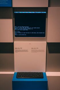 Zork text on a screen with a museum placard below