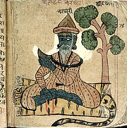 Painting of a bearded man sitting cross-legged