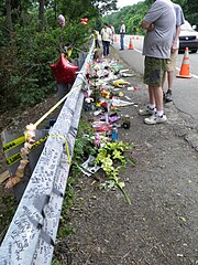 Flowers, balloons, and notes left at the crash scene in West Goshen Township, Pennsylvania, United States