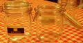 Flip-top or bail closure on storage jar
