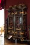 Baroque cupboard; by André Charles Boulle; c.1700; ebony and amaranth veneering, polychrome woods, brass, tin, shell, and horn marquetry on an oak frame, gilt-bronze; 255.5 x 157.5 cm; Louvre[53]