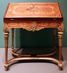 Baroque slant-front desk; by Heinrich Ludwig Rohde or Ferdinand Plitzner; c.1715–1725; marquetry with maple, amaranth, mahogany, and walnut on spruce and oak; 90 × 84 × 44.5 cm; Art Institute of Chicago[55]