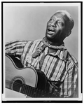 Leadbelly-w-guitar.gif