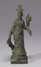 Metal figurine of a woman