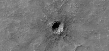 Small crater, as seen by HiRISE under HiWish program. Much of the ejecta consists of boulders.