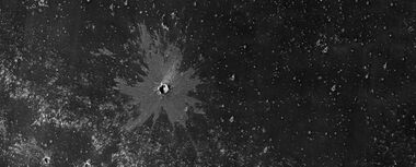 Young crater with bright ejecta, as seen by HiRISE under HiWish program The impact reached down to a layer that is light-toned. That light-toned material was then deposited on a dark surface.