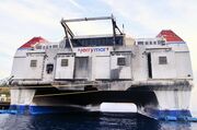 Laid up in Curaçao. The dirt on the back is soot from the diesel generators.