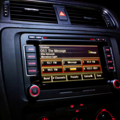 An example of the evolution: 2010's Volkswagen has a smart panel both with buttons and a touch screen to play music.