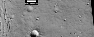 Close view of cracks of various sizes, as seen by HiRISE under HiWish program. Ice disappears along crack surfaces and makes crack larger. Note that small craters do not have very big rims; they may be just pits.