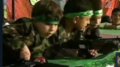 Young Palestinian boys hold toy guns in a play held in Gaza as part of the ‘Palestine Festival for Children and Education,’ April 2016.png