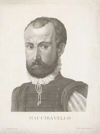 Black-and-white portrait of a bearded man wearing a high-collared shirt