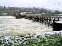 A manually operated needle dam-type weir near Revin on the River Meuse, France
