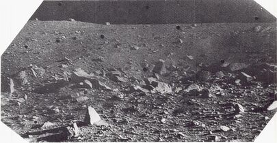 Angular blocks, up to 7 feet (2 metres)* in diameter, which form part of a strewn field of blocks that surround a sharp-rim crater 10 feet (3 metres)* in diameter