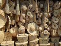 Straw hats and baskets for sale at the Luangwa turn-off on Great East road, Zambia.