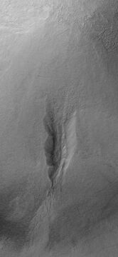 Gully on mound as seen by Mars Global Surveyor, under the MOC Public Targeting Program. Images of gullies on isolated peaks, like this one, are difficult to explain with the theory of water coming from aquifers because aquifers need large collecting areas.