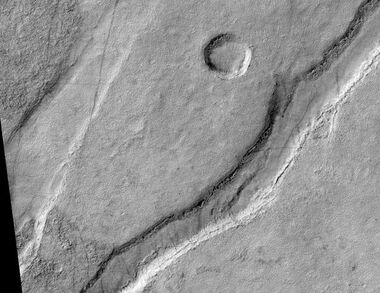 Icaria Fossae Graben, as seen by HiRISE. Click on image for a better view of Dust Devil Tracks.