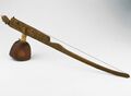Indonesia, 20th century. Heterchord stick zither, using a gourd resonator. Example of a vertical board being use instead of a bar, called a lath-zither.[3] Still considered bar zither.[1]