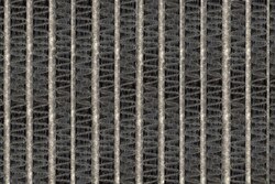 Biogrowth between the fins of an uncleaned air conditioner evaporator.