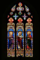 A brightly coloured window at Cassagnes-Bégonhès, Aveyron
